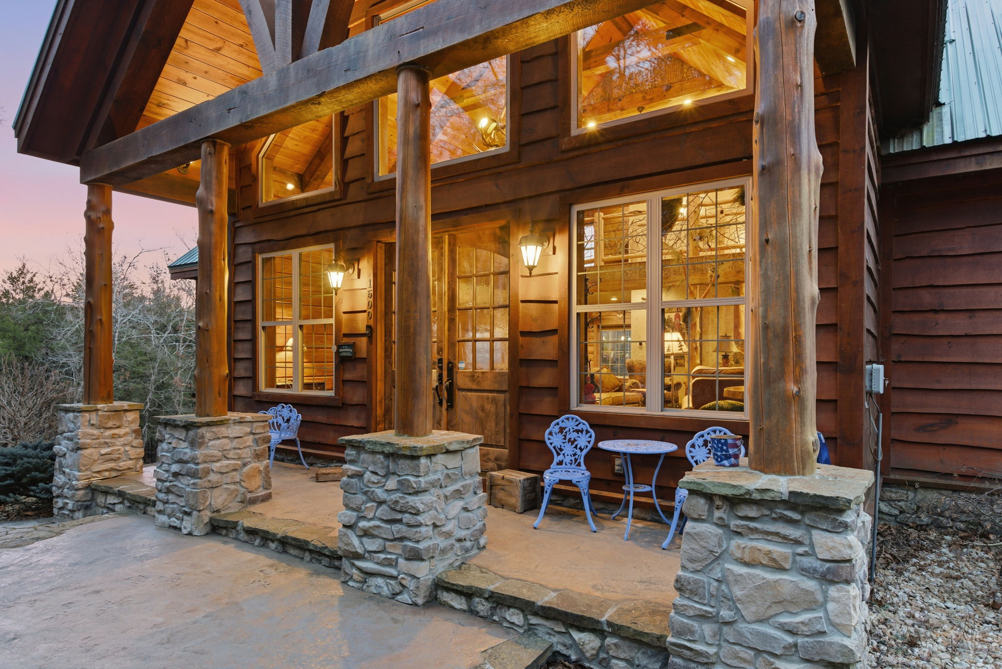Front entry with blue iron chairs