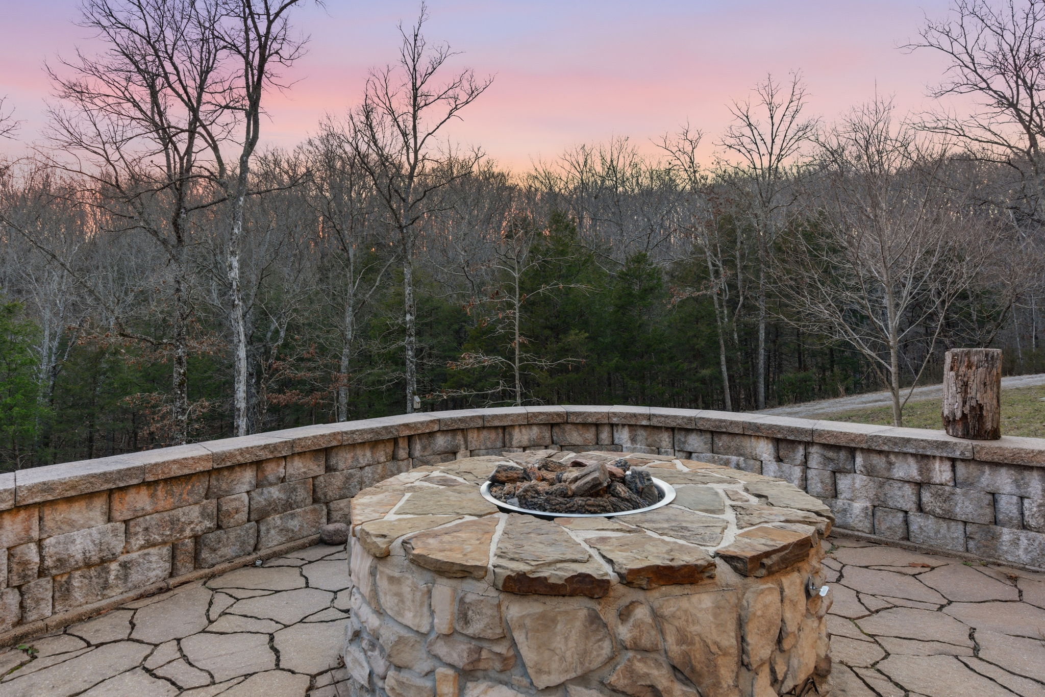 Stone fire pit at dusk